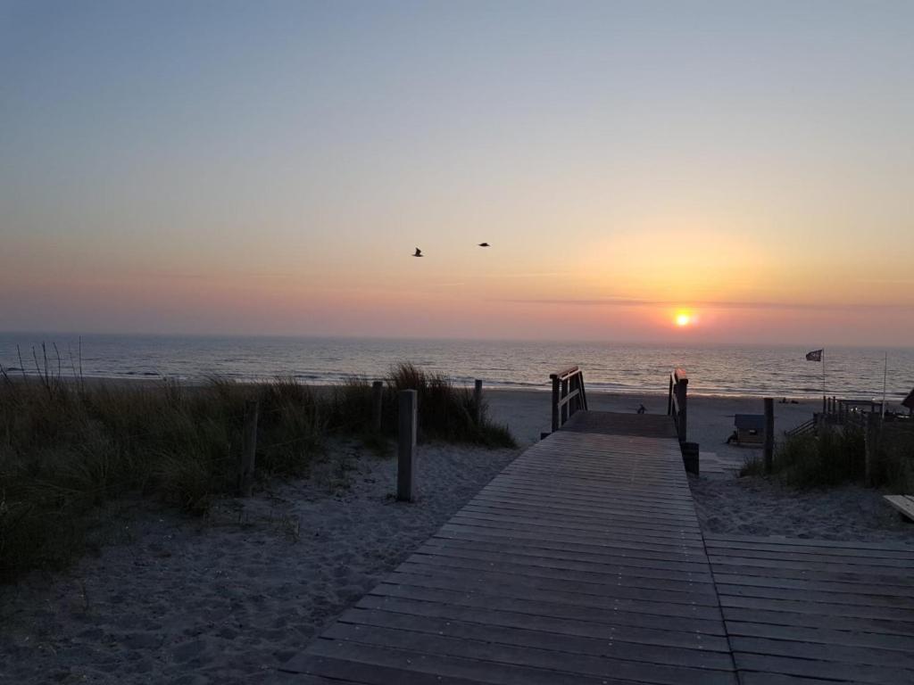 Strandhuis De Zon - Recreatiepark De Watersnip Petten Extérieur photo
